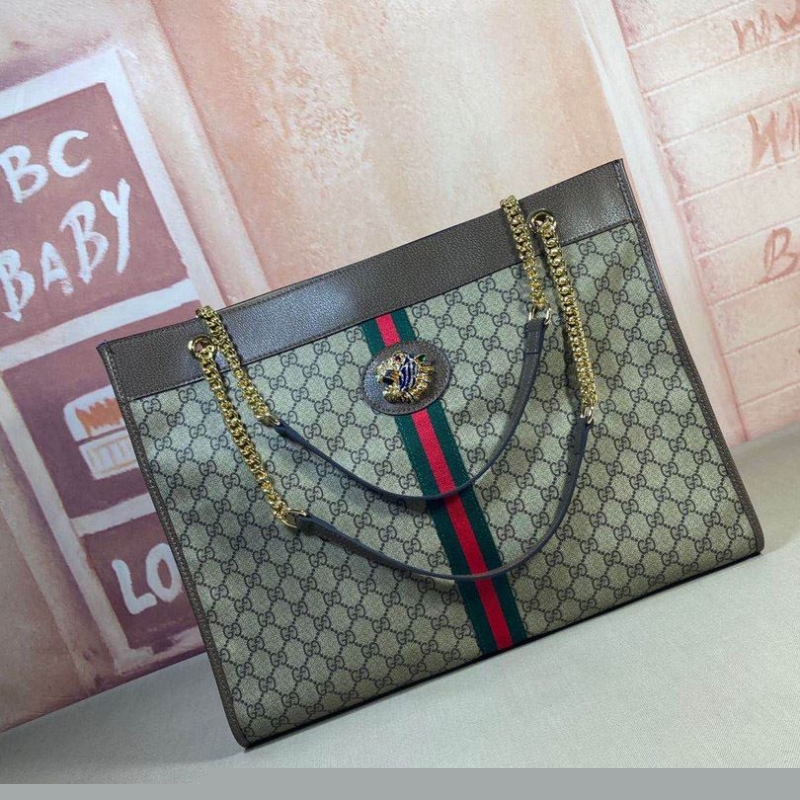 G*u*i shopping bags